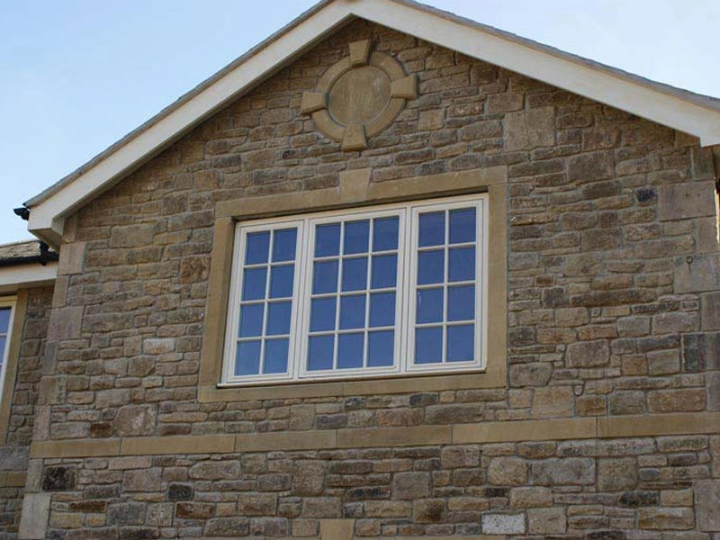 flush-casements-side-of-a-building-with-window-with-a-small-grid-pattern-fitted-at-bracknell