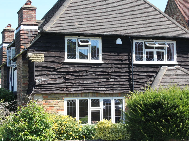 legacy-house-with-half-wood-walls-and-half-brick-with-styled-window-frames-on-both-walls-fitted-in-bracknell