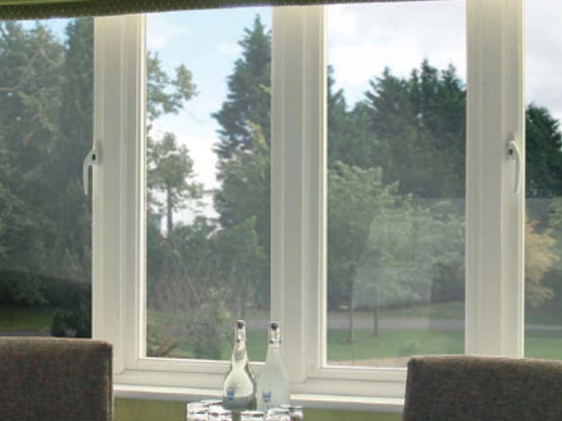 timber-storm-windows-inside-looking-outside-clean-white-frames-windows-fitted-in-bracknell