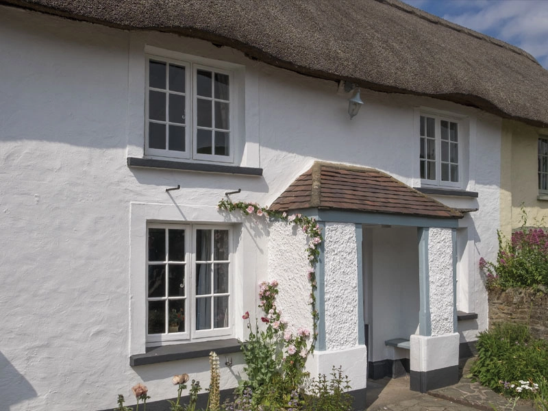 timber-storm-windows-white-cottage-autumn-home-improvements-bracknell