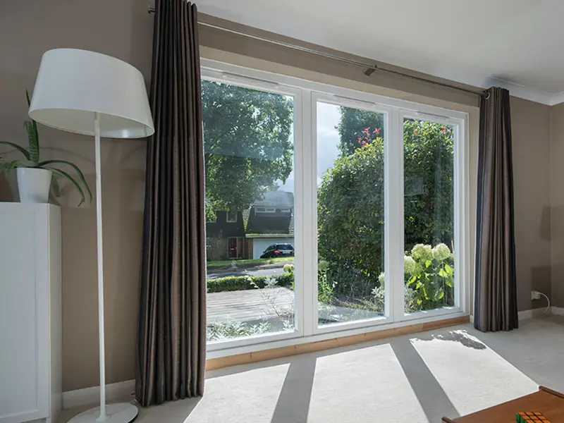 residence-2-windows-inside-room-looking-out-the-tall-white-windows-fitted-in-bedfordshire