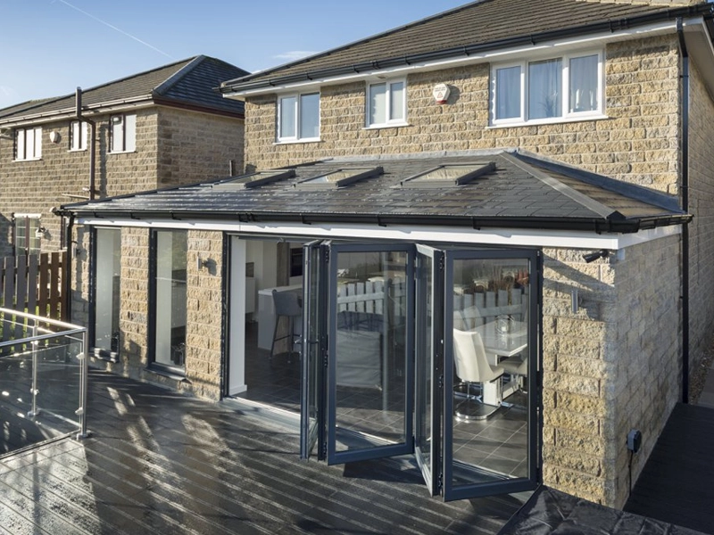 tiled-effect-roof-outside-a-house-looking-at-the-room-with-three-skylight-roof-systems-fitted-in-bedfordshire