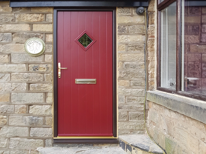 timber-scotdoors-door-back-door-with-a-red-wooden-framed-wooden-door-with-a-dimond-saped-window-fitted-in-bedfordshire