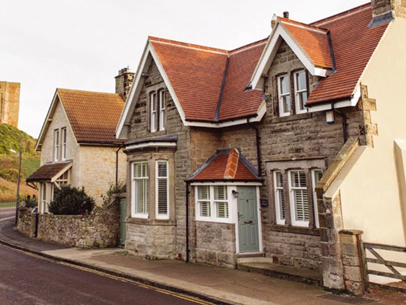 vertical-sliding-slash-outside-village-house-with-windows-being-different-sizes-and-different-designs-fitted-in-kettering