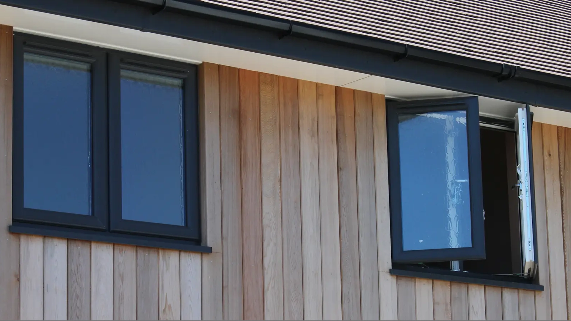 french-windows-two-black-frames-windows-one-on-latch-fitted-by-ridon-glass-in-southampton