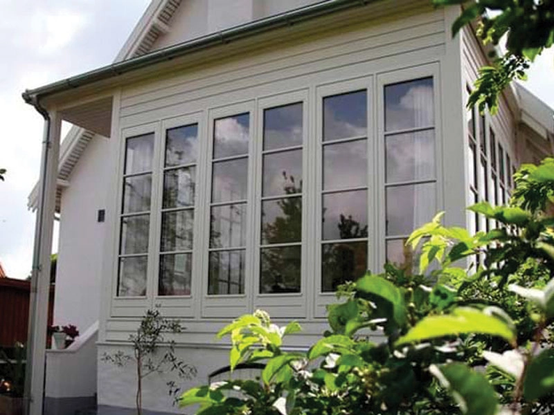alu-clad-tilt-and-turn-a-big-window-at-the-front-of-the-house-in-a-grid-shaped-frame-fitted-in-bromley