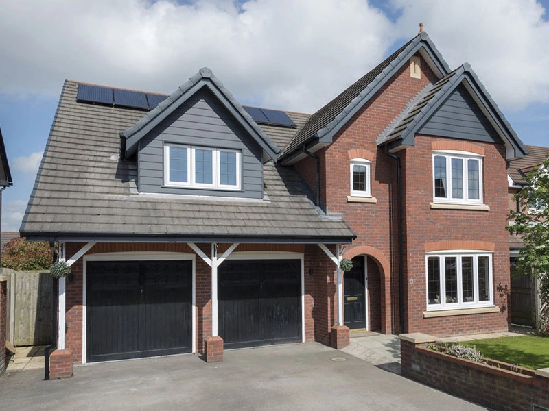 timberweld-outside-a-big-house-with-different-styled-windows-on-both-floors-fitted-at-headstart-in-reading