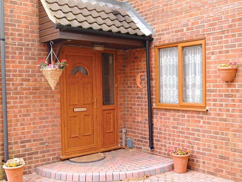 alternative-to-timber-font-door-in-a-light-brown-woodgrain-finish-woking