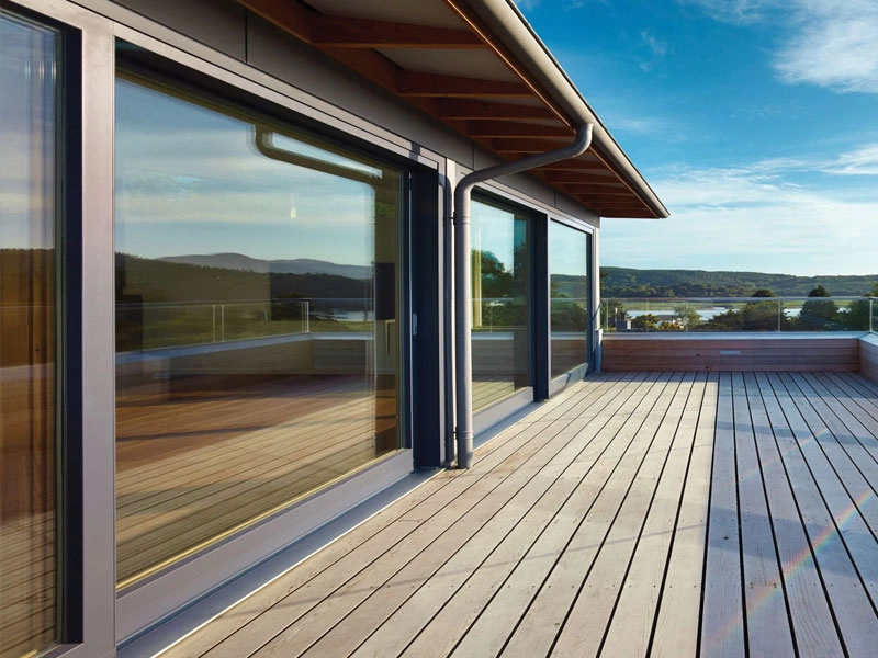 alu-clad-timber-doors-outside-on-a-patioviewing-the-large-glass-doors-fitted-in-woking