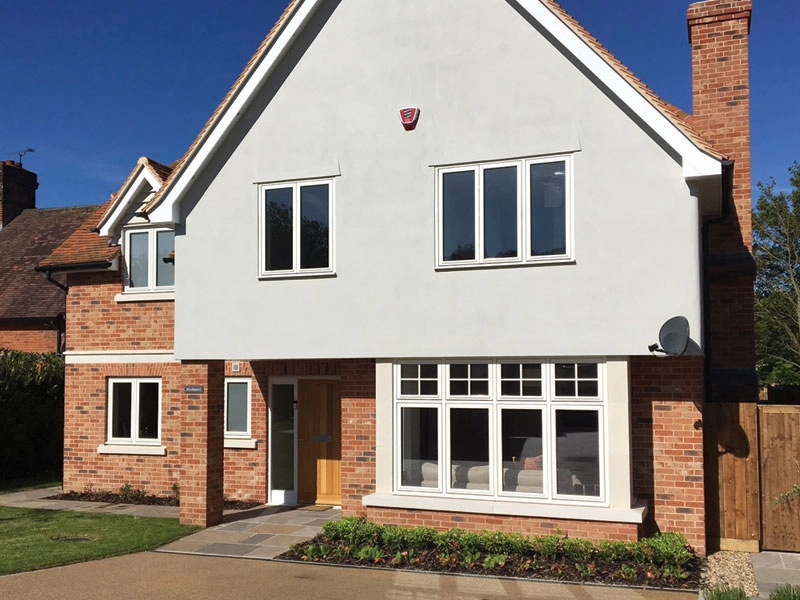 flush-casements-front-of-a-house-with-windows-seperated-at-the-top-and-a-group-underneath-fitted-at-woking