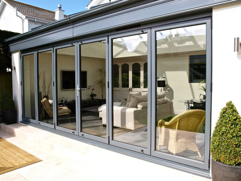 aluminium-bi-folding-doors-outside-using-the-folding-doors-to-increate-size-of-an-extension-fitted-in-yeovil