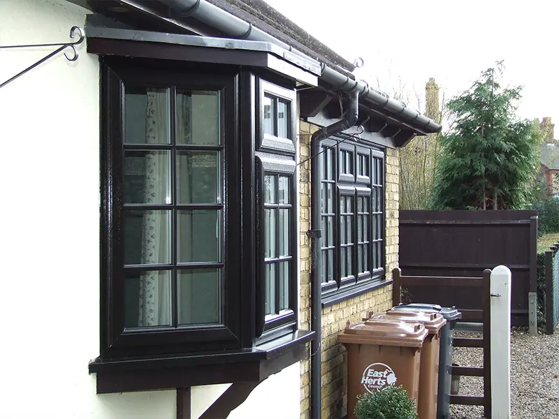 bay-and-bow-windows-looking-at-black-framed-bow-window-fitted-in-yeovil