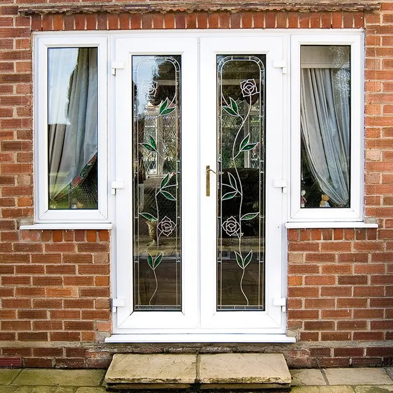 french-doors-front-view-of-double-doorswith-a-flower-pattern-in-the-glass-with-colour-fitted-in-yeovil