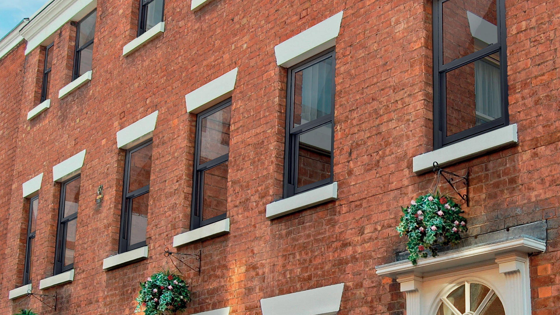 vertical-sliding-windows-a-big-house-with-multiple-windows-on-multiple-floors-fitted-by-allglass-in-yeovil